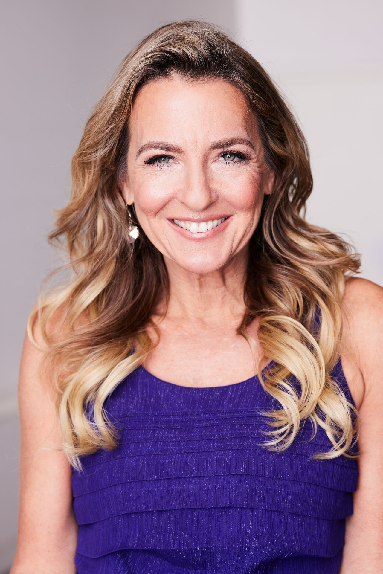 Headshot of Julie Weiss, the Marathon Goddess